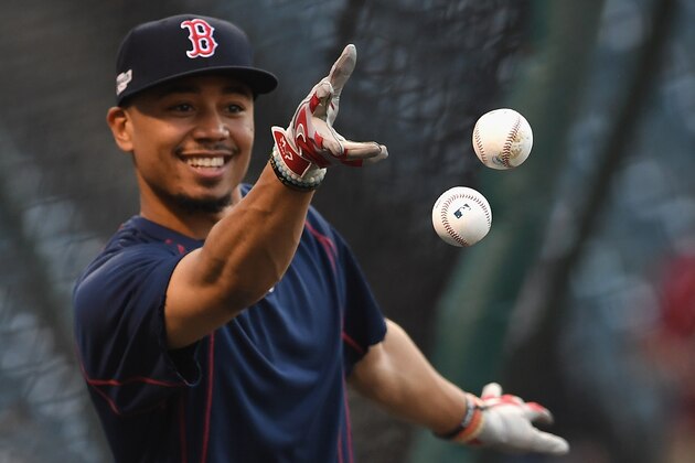 CLEVELAND, OH - OCTOBER 06:  Mookie Betts #50 of the Boston Red Sox tosses baseballs prior to game one of the American League Divison Series against the Cleveland Indians at Progressive Field on October 6, 2016 in Cleveland, Ohio.  (Photo by Jason Miller/Getty Images)