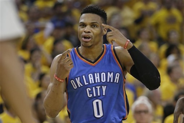 Oklahoma City Thunder guard Russell Westbrook (0) gestures toward an official during the second half of Game 7 of the NBA basketball Western Conference finals against the Golden State Warriors in Oakland, Calif., Monday, May 30, 2016. (AP Photo/Marcio Jose Sanchez)
