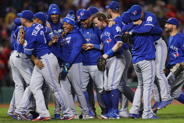 BOSTON, MA - OCTOBER 02:  The Toronto Blue Jays celebrate clinching a Wildcard spot in the playoffs after their 2-1 win over the Boston Red Sox  at Fenway Park on October 2, 2016 in Boston, Massachusetts.  (Photo by Maddie Meyer/Getty Images)