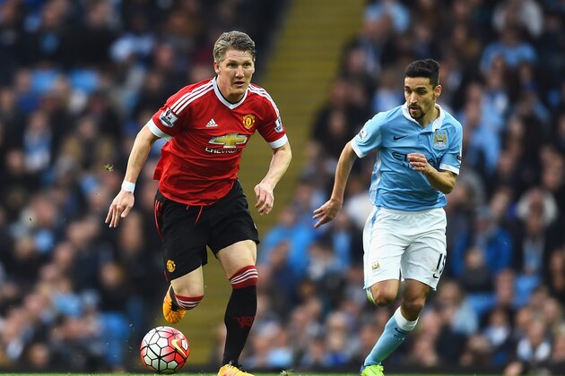 MANCHESTER, ENGLAND - MARCH 20:  Bastian Schweinsteiger of Manchester United is chased by Jesus Navas of Manchester City during the Barclays Premier League match between Manchester City and Manchester United at Etihad Stadium on March 20, 2016 in Manchester, United Kingdom.  (Photo by Laurence Griffiths/Getty Images)