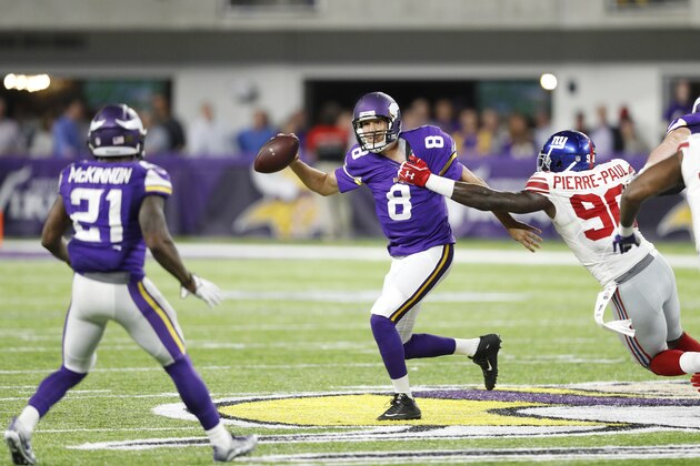 MINNEAPOLIS, MN - OCTOBER 03: Sam Bradford #8 of the Minnesota Vikings throws a pass while under pressure from Jason Pierre-Paul #90 of the New York Giants during the game at U.S. Bank Stadium on October 3, 2016 in Minneapolis, Minnesota. The Vikings defeated the Giants 24-10. (Photo by Joe Robbins/Getty Images)
