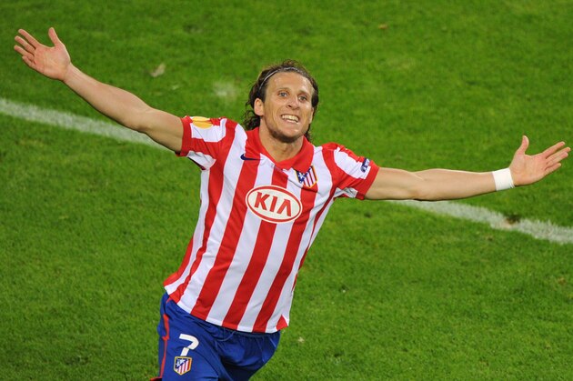 (FILES) This file picture dated  May 12, 2010 shows Atletico Madrid's Uruguayan forward Diego Forlan celebrating after scoring during the final football match of the UEFA Europa League Fulham FC vs Aletico Madrid in Hamburg, northern Germany. Uruguay international Diego Forlan confirmed on August 29, 2011 that he is heading to Inter Milan but said Atletico Madrid would always be in his heart. The striker joined Atletico in 2007 from Villarreal and was under contract with the club for another two seasons but he fell out of favour with club officials last season after a disappointing campaign. AFP PHOTO / NIGEL TREBLIN (Photo credit should read NIGEL TREBLIN/AFP/Getty Images)