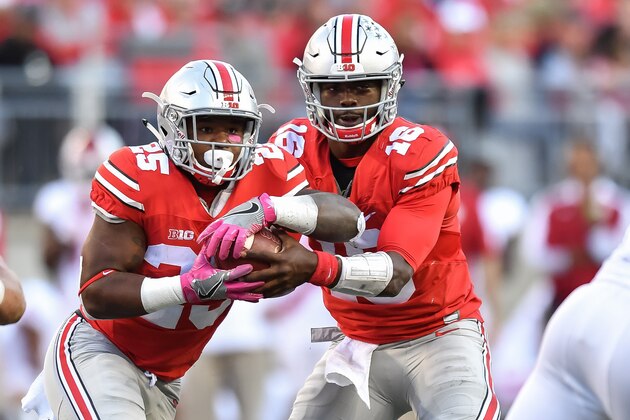 COLUMBUS, OH - OCTOBER 8:  Quarterback J.T. Barrett #16 of the Ohio State Buckeyes hands off to Mike Weber #25 of the Ohio State Buckeyes against the Indiana Hoosiers at Ohio Stadium on October 8, 2016 in Columbus, Ohio. Ohio State defeated Indiana 38-17.  (Photo by Jamie Sabau/Getty Images)