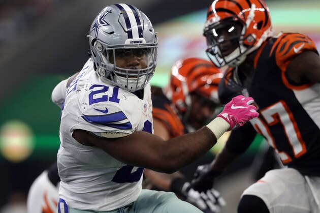 ARLINGTON, TX - OCTOBER 09:   Ezekiel Elliott #21 of the Dallas Cowboys rushes with the ball against the Cincinnati Bengals at AT&T Stadium on October 9, 2016 in Arlington, Texas. (Photo by Ronald Martinez/Getty Images)