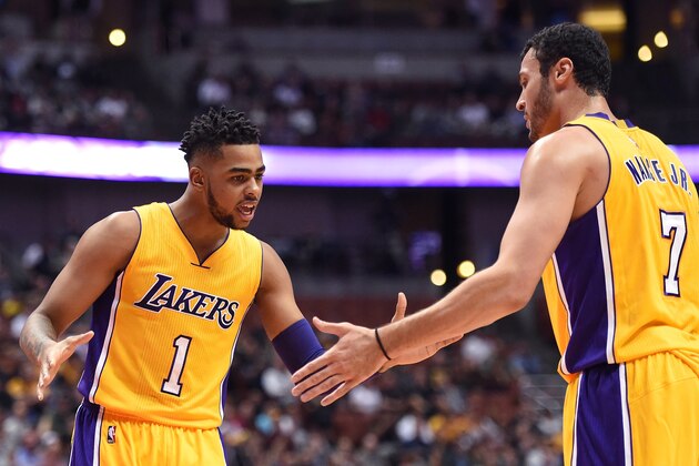 ANAHEIM, CA - OCTOBER 04:  D'Angelo Russell #1 and Larry Nance Jr. #7 of the Los Angeles Lakers celebrate a play during a preseason game against the Sacramento Kings at Honda Center on October 4, 2016 in Anaheim, California.  NOTE TO USER: User expressly acknowledges and agrees that, by downloading and or using this photograph, User is consenting to the terms and conditions of the Getty Images License Agreement.  (Photo by Harry How/Getty Images)