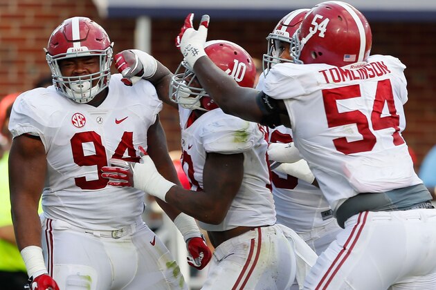 OXFORD, MS - SEPTEMBER 17:  Da'Ron Payne #34 of the Alabama Crimson Tide celebrates with his teammates after he recovered a fumble for a touchdown against the Mississippi Rebels at Vaught-Hemingway Stadium on September 17, 2016 in Oxford, Mississippi.  (Photo by Kevin C. Cox/Getty Images)