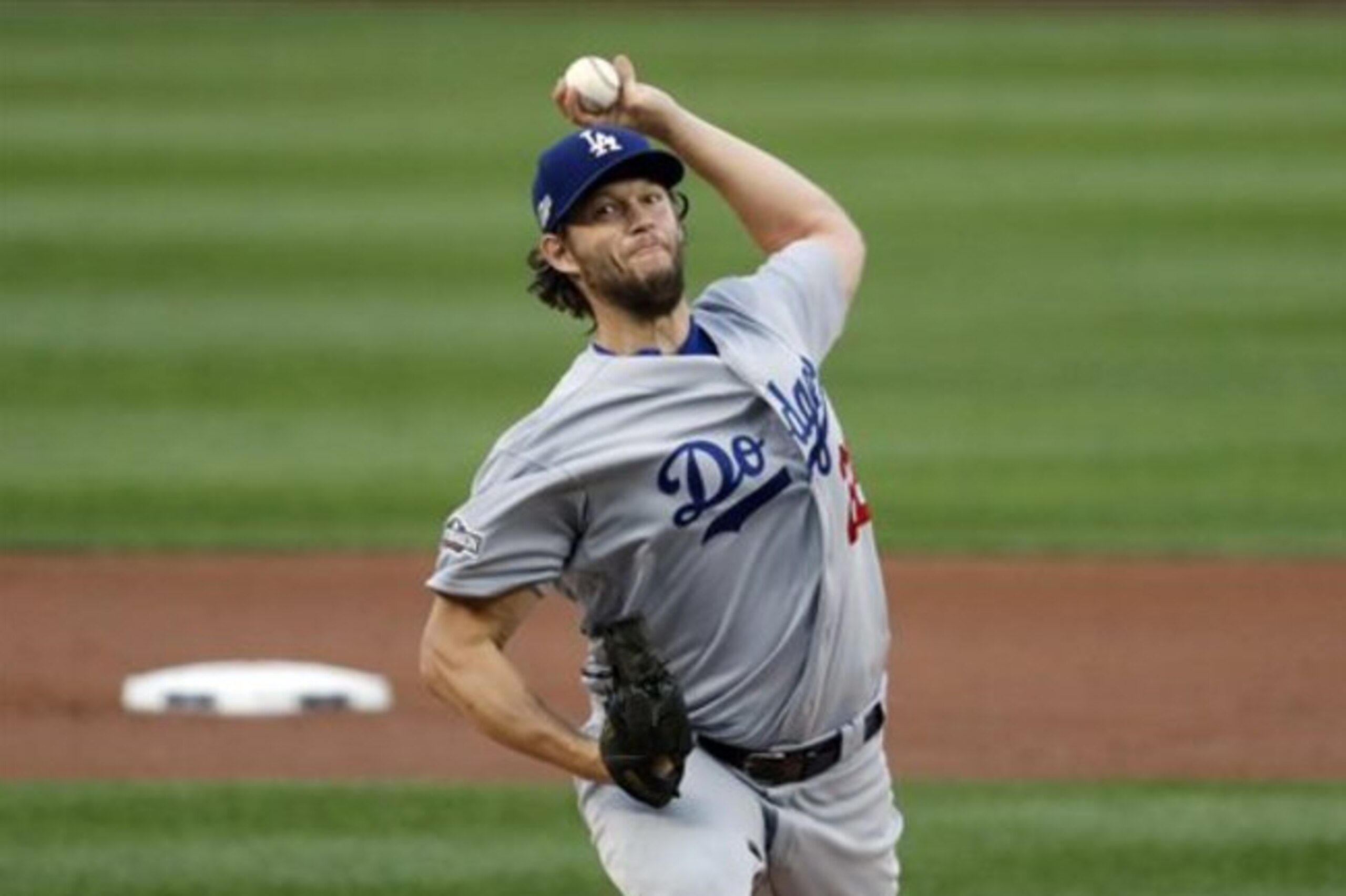 Los Angeles Dodgers starting pitcher Clayton Kershaw throws during Game 1 of baseball's National League Division Series against the Washington Nationals, at Nationals Park, Friday, Oct. 7, 2016, in Washington. (AP Photo/Alex Brandon) Los Angeles Dodgers starting pitcher Clayton Kershaw throws during Game 1 of baseball's National League Division Series against the Washington Nationals, at Nationals Park, Friday, Oct. 7, 2016, in Washington. (AP Photo/Alex Brandon)