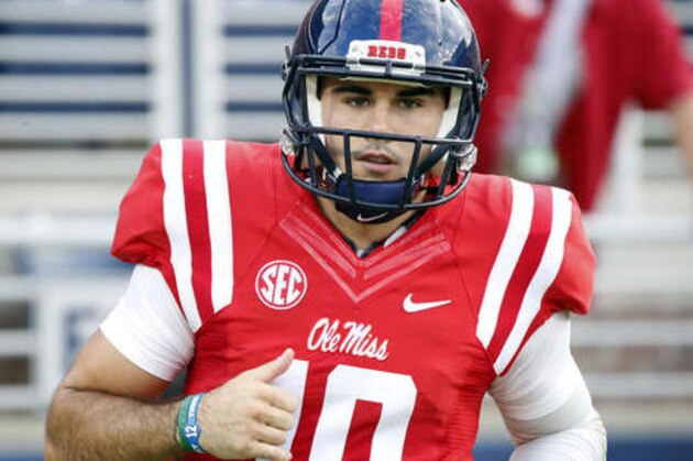 Mississippi quarterback Chad Kelly (10) runs around the field during pre-game drills before their NCAA college football game against Memphis, Saturday, Oct. 1, 2016, in Oxford, Miss.  (AP Photo/Rogelio V. Solis)