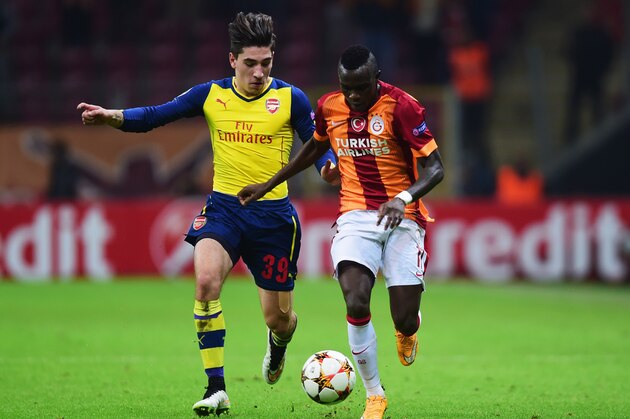 ISTANBUL, TURKEY - DECEMBER 09:  Hector Bellerin of Arsenal chases the ball with Bruma of Galatasaray during the UEFA Champions League Group D match between Galatasaray AS and Arsenal FC at Ali Sami Yen Arena on December 9, 2014 in Istanbul, Turkey.  (Photo by Jamie McDonald/Getty Images)