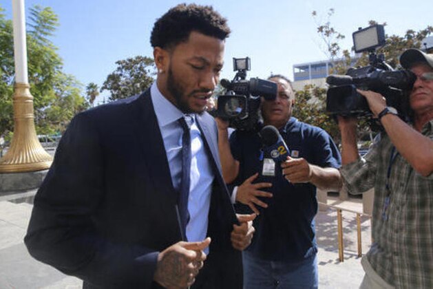New York Knicks basketball player Derrick Rose arrives at U.S. District Court in downtown Los Angeles on Thursday, Oct. 6, 2016. A six-woman, two-man jury has been seated in the trial of a civil lawsuit brought against Derrick Rose by an ex-girlfriend who alleges the NBA star and two of his friends drugged and sexually assaulted her. (AP Photo/Damian Dovarganes)