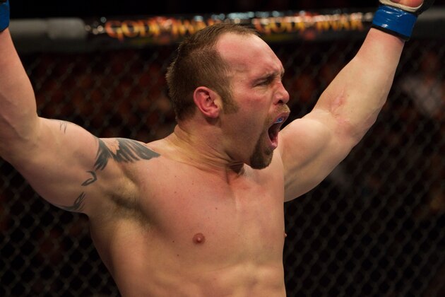 NEWARK, NJ - MARCH 27:  Shane Carwin (red/white shorts) def. Frank Mir (black shorts) - KO - 3:48 round 1 during UFC 111 at Prudential Center on March 27, 2010 in Newark, New Jersey. (Photo by Josh Hedges/Zuffa LLC via Getty Images)