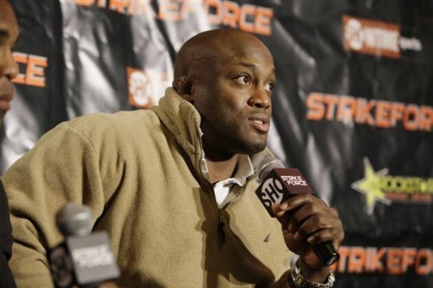 Wrestler Bobby Lashley discusses his upcoming MMA match during a Strikeforce news conference in Miami Lakes, Fla. on Tuesday, Jan. 12, 2010.  (AP Photo/J Pat Carter)