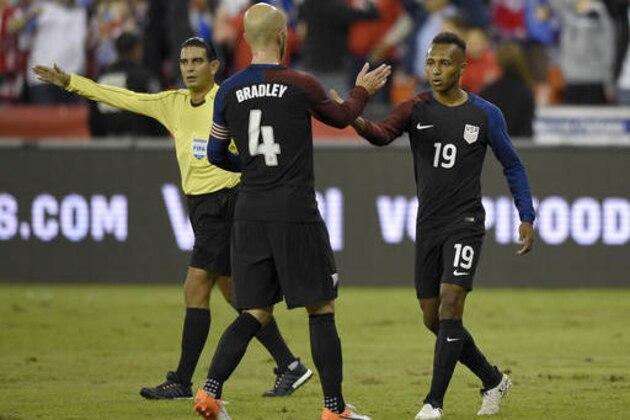 U.S. forward Julian Green (19) celebrates his goal with midfielder Michael Bradley (4) during the first half of an international friendly soccer match against New Zealand, Tuesday, Oct. 11, 2016, in Washington. (AP Photo/Nick Wass)