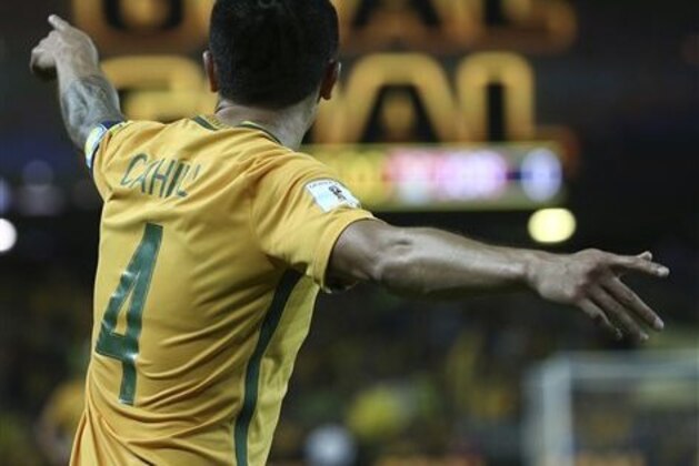 Australia's Tim Cahill celebrates after scoring his second goal during their 2018 FIFA World Cup qualifier against Jordan in Sydney, Australia, Tuesday, March 29, 2016.(AP Photo/Rob Griffith)