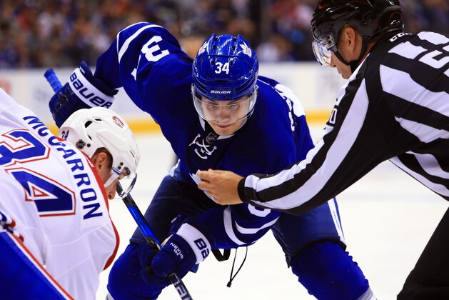 TORONTO, CANADA - OCTOBER 02:  Auston Matthews #34 of the Toronto Maple Leafs takes a face-off during an NHL preseason game against the Montreal Canadiens at Air Canada Centre on October 2, 2016 in Toronto, Canada.  (Photo by Vaughn Ridley/Getty Images)