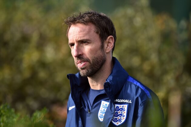England's interim manager Gareth Southgate overseas a team training at Tottenham Hotspur's football training facility in Enfield, north London on October 10, 2016 on the eve of the team's World Cup qualifying match against Slovenia.                                                               / AFP / GLYN KIRK / NOT FOR MARKETING OR ADVERTISING USE / RESTRICTED TO EDITORIAL USE         (Photo credit should read GLYN KIRK/AFP/Getty Images)