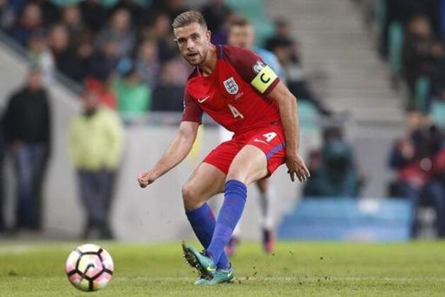 England's Jordan Henderson controls the ball during the World Cup Group F qualifying soccer match between Slovenia and England, at Stozice stadium in Ljubljana, Slovenia, Tuesday, Oct. 11, 2016. (AP Photo/Darko Bandic)