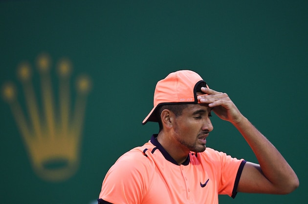 Nick Kyrgios of Canada reacts to his serve against Mischa Zverev of Germany during their men's singles match at the Shanghai Masters tennis tournament in Shanghai on October 12, 2016. / AFP / JOHANNES EISELE        (Photo credit should read JOHANNES EISELE/AFP/Getty Images)
