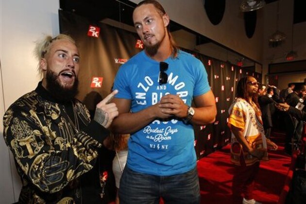 IMAGE DISTRIBUTED FOR 2K - WWE Superstars Enzo and Cass, right, are seen at the WWE 2K17 SummerSlam Kickoff Event in New York, on Friday, Aug. 19, 2016. (Adam Hunger/AP Images for 2K)