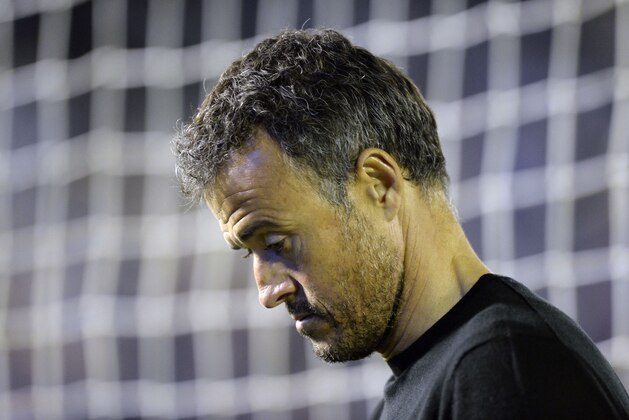 Barcelona's coach Luis Enrique looks towards the ground during the Spanish league football match RC Celta de Vigo vs FC Barcelona at the Balaidos stadium in Vigo on October 2, 2016. / AFP / MIGUEL RIOPA        (Photo credit should read MIGUEL RIOPA/AFP/Getty Images)