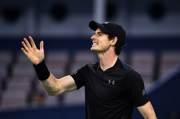 Andy Murray of Britain hits a return against Steve Johnson of the US during their men's singles match at the Shanghai Masters tennis tournament in Shanghai on October 12, 2016. / AFP / JOHANNES EISELE        (Photo credit should read JOHANNES EISELE/AFP/Getty Images)