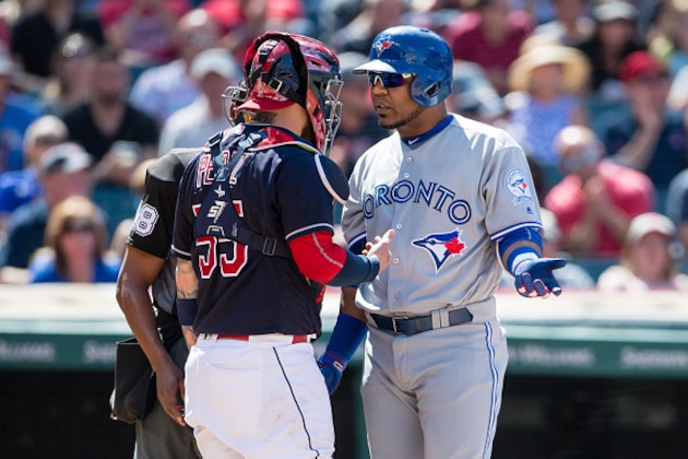 CLEVELAND, OH - AUGUST 21: Catcher Roberto Perez #55 of the Cleveland Indians and Edwin Encarnacion #10 of the Toronto Blue Jays have a heated discussion at home plate during the seventh inning at Progressive Field on August 21, 2016 in Cleveland, Ohio. (Photo by Jason Miller/Getty Images)