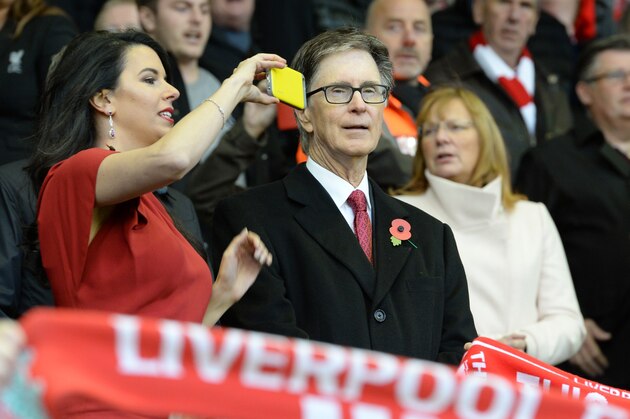 Liverpool's US owner John W. Henry's wife Linda Pizzuti (L) takes a photograph during the English Premier League football match between Liverpool and Southampton at Anfield stadium in Liverpool, north west England on October 25, 2015. AFP PHOTO / OLI SCARFF

RESTRICTED TO EDITORIAL USE. No use with unauthorized audio, video, data, fixture lists, club/league logos or 'live' services. Online in-match use limited to 75 images, no video emulation. No use in betting, games or single club/league/player publications.        (Photo credit should read OLI SCARFF/AFP/Getty Images)