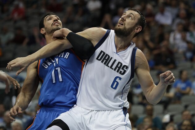 DALLAS, TX - OCTOBER 11:  Enes Kanter #11 of the Oklahoma City Thunder and Andrew Bogut #6 of the Dallas Mavericks battle during a preseason game at American Airlines Center on October 11, 2016 in Dallas, Texas.  (Photo by Ronald Martinez/Getty Images)