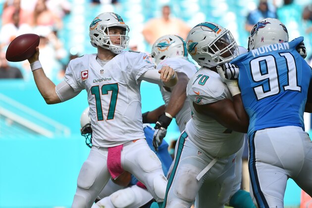 Oct 9, 2016; Miami Gardens, FL, USA; Miami Dolphins quarterback Ryan Tannehill (17) attempts a pass against the Tennessee Titans during the second half at Hard Rock Stadium. The Tennessee Titans defeat the Miami Dolphins 30-17. Mandatory Credit: Jasen Vinlove-USA TODAY Sports
