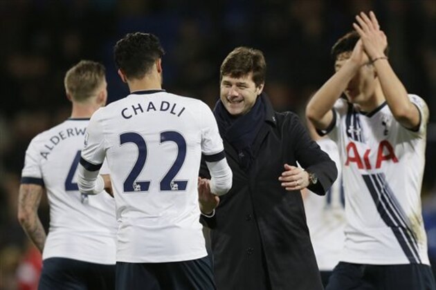Tottenham manager Mauricio Pochettino, centre, congratulates Tottenham’s Nacer Chadli after the English Premier League soccer match between Crystal Palace and Tottenham Hotspur at Selhurst Park in London, Saturday Jan. 23, 2016. (AP Photo/Tim Ireland)
