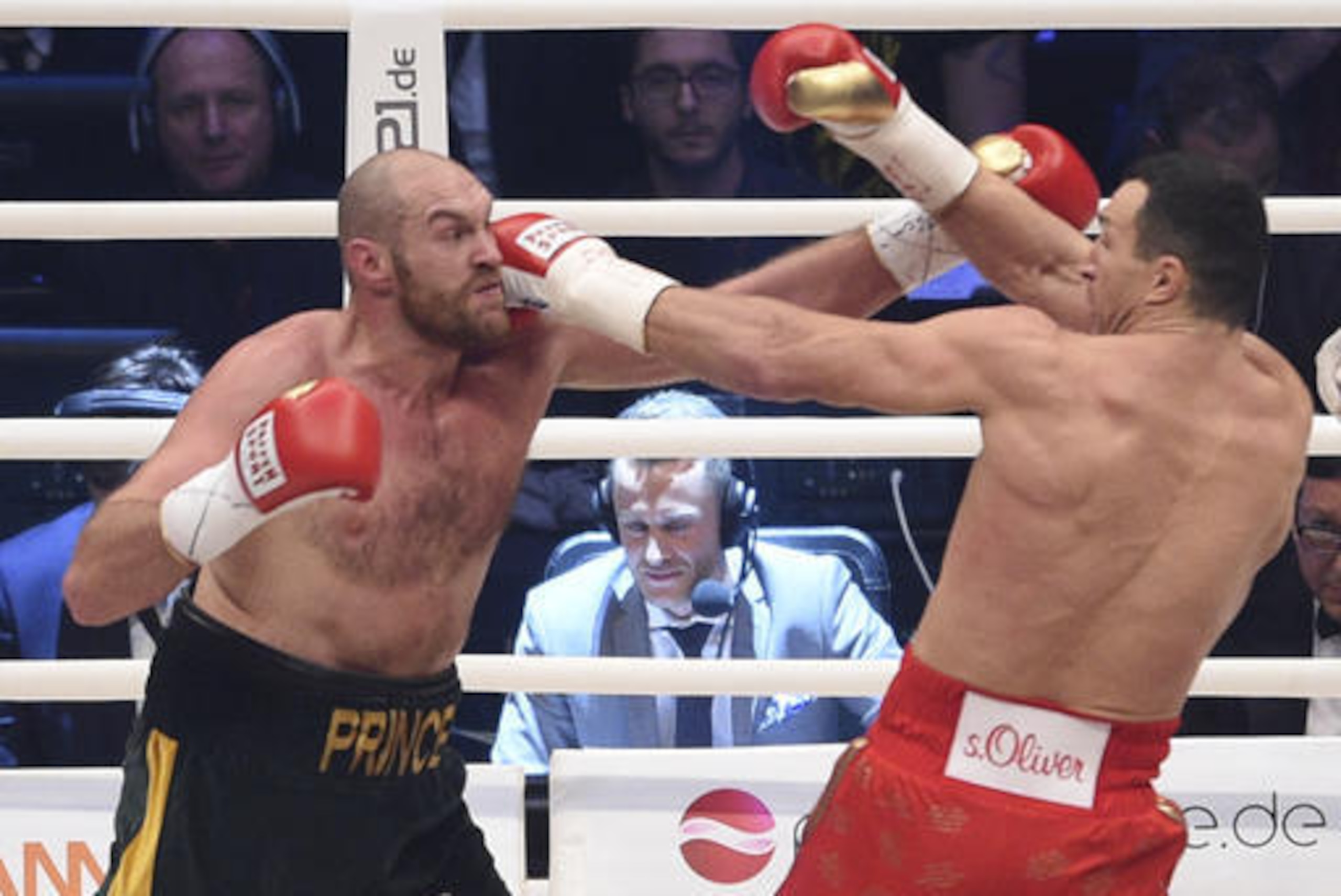 FILE - In this Nov. 28, 2015 file picture Ukraine's Wladimir Klitschko, right, and Britain's Tyson Fury  compete  in a world heavyweight title fight for Klitschko's WBA, IBF, WBO and IBO belts in the Esprit Arena in Duesseldorf, western Germany.  The heavyweight rematch between Tyson Fury and Wladimir Klitschko has been rescheduled for Oct. 29 at the Manchester Arena. Fury beat Klitschko in November to claim the WBA, WBO and IBF titles. A rematch was originally scheduled for July 9 but was postponed after Fury sustained an ankle injury. The new date was announced Wednesday Sept. 7, 2016  by both fighters' management teams. (AP Photo/Sebastian Konopka,file)