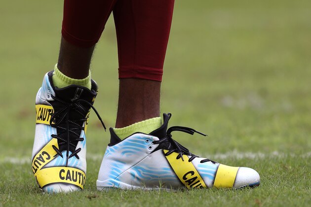 LANDOVER, MD - OCTOBER 2: Wide receiver DeSean Jackson #11 of the Washington Redskins wears cleats displaying police caution tape prior to a game against the Cleveland Browns at FedExField on October 2, 2016 in Landover, Maryland. (Photo by Patrick Smith/Getty Images)