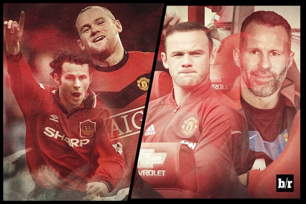 Manchester United’s assistant manager Ryan Giggs speaks to Manchester United’s Wayne Rooney on the sidelines during the English FA Cup quarterfinal soccer match between Manchester United and Arsenal at Old Trafford Stadium, Manchester, England, Monday March 9, 2015. (AP Photo/Jon Super)