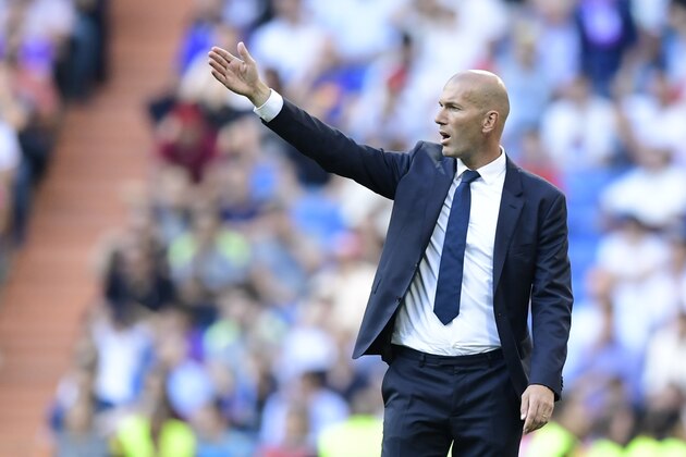 Real Madrid's French coach Zinedine Zidane gestures during the Spanish league football match Real Madrid CF vs SD Eibar at the Santiago Bernabeu stadium in Madrid on October 2, 2016. / AFP / JAVIER SORIANO        (Photo credit should read JAVIER SORIANO/AFP/Getty Images)