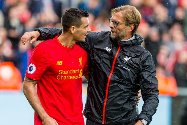SWANSEA, WALES - OCTOBER 01:  (L-R) Dejan Lovren of Liverpool  and Manager of Liverpool, Jurgen Klopp after final whistle of the  the Premier League match between Swansea City and Liverpool at The Liberty Stadium on October 1, 2016 in Swansea, Wales. (Photo by Athena Pictures/Getty Images)