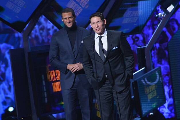 NEW YORK, NY - FEBRUARY 01:  San Francisco 49ers quarterback Colin Kaepernick (L) and former San Francisco 49ers quarterback Steve Young attend the 3rd Annual NFL Honors at Radio City Music Hall on February 1, 2014 in New York City.  (Photo by Slaven Vlasic/Getty Images)