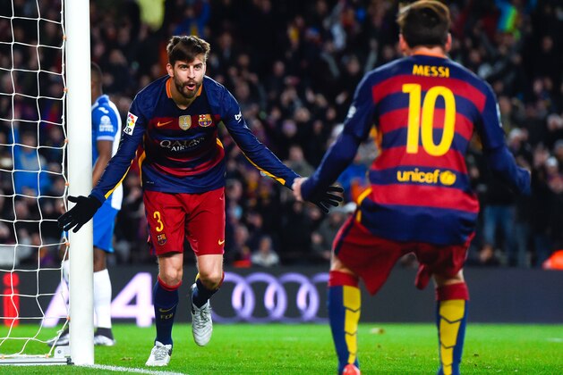 BARCELONA, SPAIN - JANUARY 06:  Gerard Pique of FC Barcelona celebrates with his teammate Lionel Messi of FC Barcelona after scoring his team's third goal during the Copa del Rey Round of 16 first leg match between FC Barcelona and RCD Espanyol at Camp Nou on January 6, 2016 in Barcelona, Spain.  (Photo by David Ramos/Getty Images)