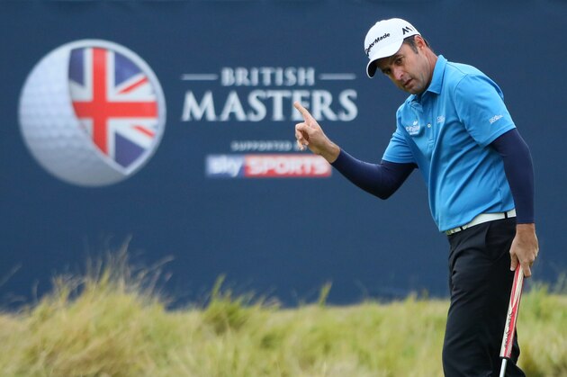 WATFORD, ENGLAND - OCTOBER 14:  Richard Bland of England takes a one shot lead after making a birdie putt on the 18th hole during the second round of the British Masters at The Grove on October 14, 2016 in Watford, England.  (Photo by Andrew Redington/Getty Images)