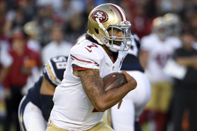 FILE - In this Sept. 1, 2016 file photo, file photo, San Francisco 49ers quarterback Colin Kaepernick runs against the San Diego Chargers during the first half of an NFL preseason football game in San Diego. Making the switch at quarterback from Blaine Gabbert to Kaepernick won't dramatically change the offense for the San Francisco 49ers. The hope for the Niners is it will change results (AP Photo/Denis Poroy, File)