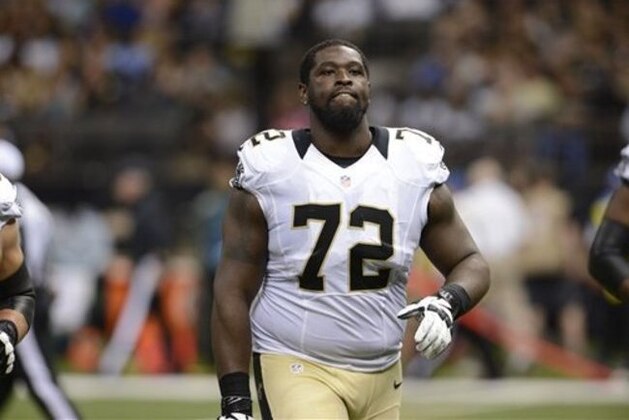 New Orleans Saints tackle Terron Armstead (72) walks on the field in the first half of a preseason NFL football game against the New England Patriots in New Orleans, Saturday, Aug. 22, 2015. (AP Photo/Bill Feig)