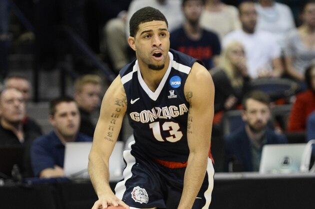 Mar 19, 2016; Denver , CO, USA; Gonzaga Bulldogs guard Josh Perkins (13) drives to the hoop in second half action of Utah vs Gonzaga during the second round of the 2016 NCAA Tournament at Pepsi Center. Mandatory Credit: Ron Chenoy-USA TODAY Sports