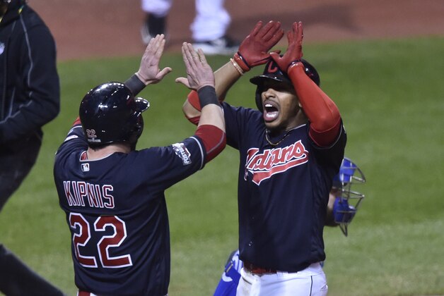 Oct 14, 2016; Cleveland, OH, USA; Cleveland Indians shortstop Francisco Lindor (right) reacts with second baseman Jason Kipnis (22) after hitting a two-run home run against the Toronto Blue Jays in the 6th inning in game one of the 2016 ALCS playoff baseball series at Progressive Field. Mandatory Credit: David Richard-USA TODAY Sports