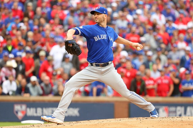 ARLINGTON, TX - OCTOBER 07:  J.A. Happ #33 of the Toronto Blue Jays delivers a pitch in the first inning against the Texas Rangers in game two of the American League Divison Series at Globe Life Park in Arlington on October 7, 2016 in Arlington, Texas.  (Photo by Scott Halleran/Getty Images)