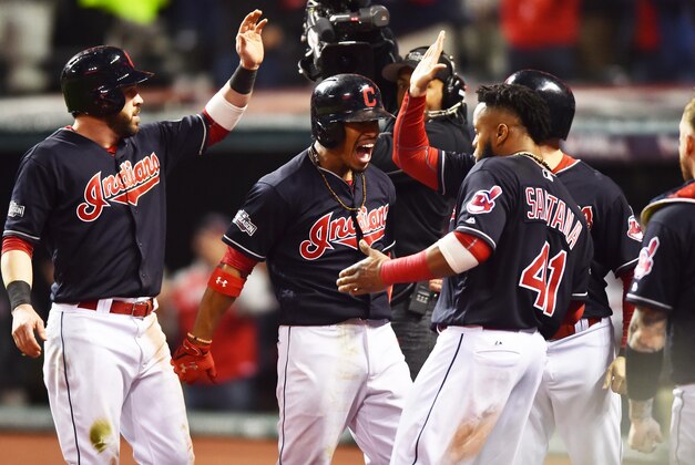 Oct 14, 2016; Cleveland, OH, USA; Cleveland Indians shortstop Francisco Lindor (middle) celebrates with teammates after hitting a two-run home run against the Toronto Blue Jays in the 6th inning in game one of the 2016 ALCS playoff baseball series at Progressive Field. Mandatory Credit: Ken Blaze-USA TODAY Sports