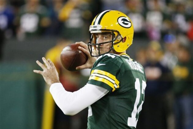 Green Bay Packers' Aaron Rodgers warms up before an NFL football game against the New York Giants Sunday, Oct. 9, 2016, in Green Bay, Wis. (AP Photo/Mike Roemer)