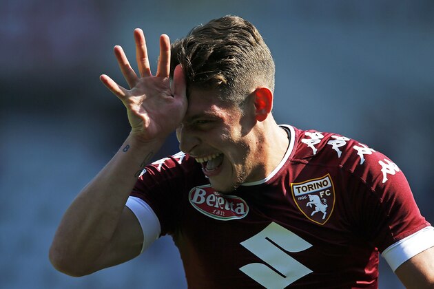Torino's Italian forward Andrea Belotti celebrates after scoring a goal during the Italian Serie A football match between Torino and AS Roma at the 'Grande Torino' Stadium in Turin on September 25, 2016. / AFP / MARCO BERTORELLO        (Photo credit should read MARCO BERTORELLO/AFP/Getty Images)