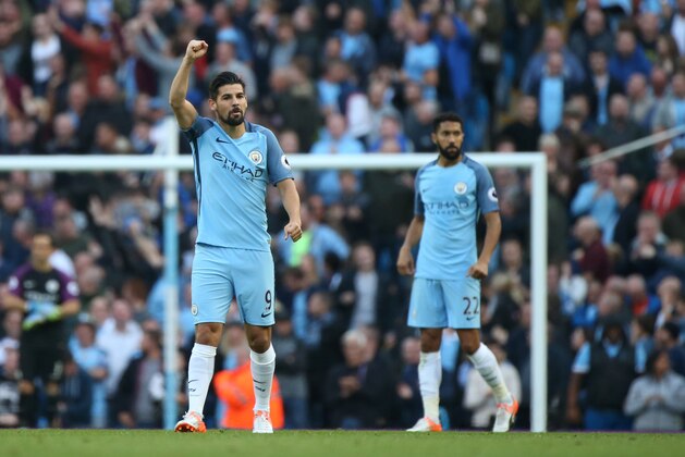 Manchester City's Spanish midfielder Nolito (L) celebrates after scoring during the English Premier League football match between Manchester City and Everton at the Etihad Stadium in Manchester, north west England, on October 15, 2016. / AFP / SCOTT HEPPELL / RESTRICTED TO EDITORIAL USE. No use with unauthorized audio, video, data, fixture lists, club/league logos or 'live' services. Online in-match use limited to 75 images, no video emulation. No use in betting, games or single club/league/player publications.  /         (Photo credit should read SCOTT HEPPELL/AFP/Getty Images)