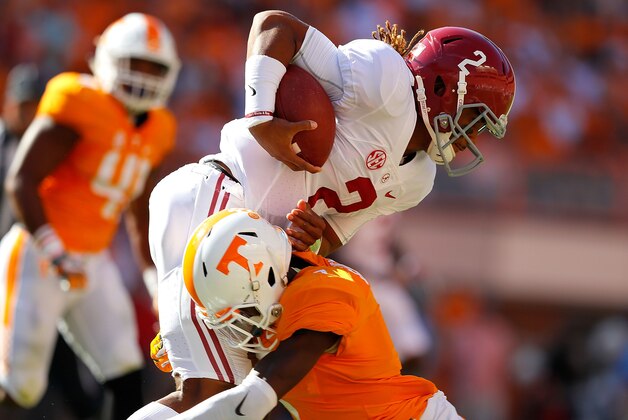 KNOXVILLE, TN - OCTOBER 15:  Rashaan Gaulden #7 of the Tennessee Volunteers tackles Jalen Hurts #2 of the Alabama Crimson Tide at Neyland Stadium on October 15, 2016 in Knoxville, Tennessee.  (Photo by Kevin C. Cox/Getty Images)