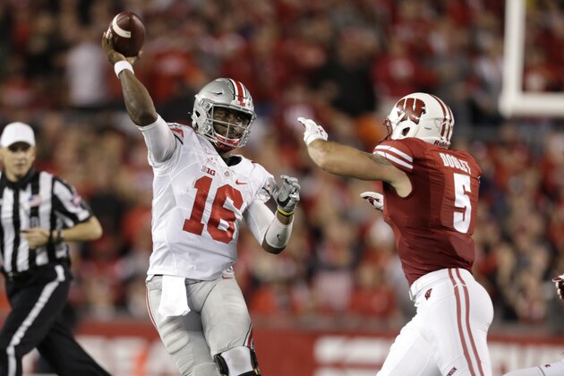 MADISON, WI - OCTOBER 15: J.T. Barrett #16 of the Ohio State Buckeyes drops back to pass the football during there second quarter during the game against the Wisconsin Badgers at Camp Randall Stadium on October 15, 2016 in Madison, Wisconsin. (Photo by Mike McGinnis/Getty Images)