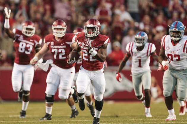 Arkansas running back Rawleigh Williams III (22) carries for a gain during the first quarter of an NCAA football game against Mississippi on Saturday, Oct. 15, 2016, in Fayetteville, Ark. (AP Photo/Chris Brashers)